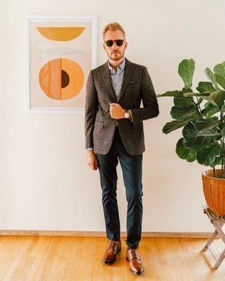 Brown Plaid Blazer Outfits For Men: A brown plaid blazer and navy chinos paired together are a sartorial dream for those dressers who love casually smart styles. Complete your ensemble with tobacco leather derby shoes for an added dose of polish.
