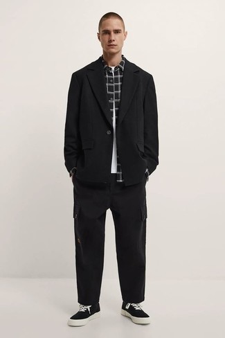 Black Blazer Outfits For Men: A black blazer and black cargo pants? It's an easy-to-achieve ensemble that anyone can work on a day-to-day basis. Tone down the classiness of this ensemble by wearing black and white canvas low top sneakers.