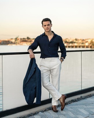 Navy Wool Blazer Outfits For Men: Wear a navy wool blazer with white dress pants if you're going for a neat, smart ensemble. Introduce a pair of brown leather loafers to the mix and ta-da: your getup is complete.