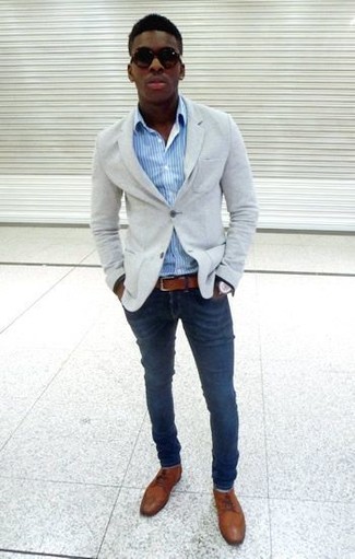 Men's Grey Knit Blazer, Light Blue Vertical Striped Long Sleeve Shirt, Navy Jeans, Brown Leather Derby Shoes