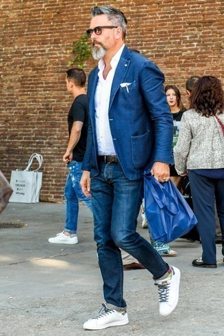Blue Denim Blazer Outfits For Men: Go for a straightforward yet stylish getup by marrying a blue denim blazer and navy jeans. Feeling inventive? Switch things up by finishing off with a pair of white leather low top sneakers.