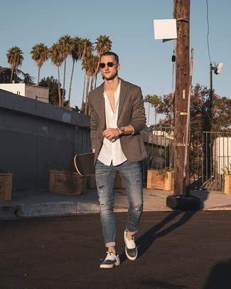 Navy Ripped Jeans Outfits For Men: Why not wear a brown blazer with navy ripped jeans? Both of these pieces are totally functional and look amazing when paired together. A great pair of white and black canvas low top sneakers pulls this outfit together.