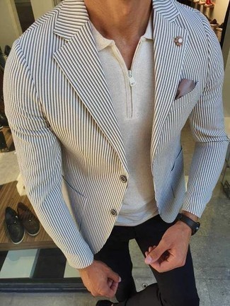 White and Navy Vertical Striped Blazer Outfits For Men: A white and navy vertical striped blazer and black chinos combined together are a smart match.