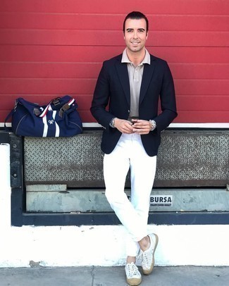 Tan Polo Outfits For Men: Try teaming a tan polo with white chinos to put together a casually stylish look. A pair of white canvas low top sneakers will be a welcome companion for this outfit.