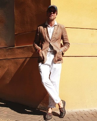 Orange Watch Outfits For Men: We all want comfort when it comes to style, and this edgy pairing of a tan linen blazer and an orange watch is a good illustration of that. If you need to immediately perk up this ensemble with one single piece, choose a pair of dark brown leather boat shoes.