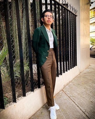 Dark Green Blazer Outfits For Men: Marry a dark green blazer with brown dress pants for a neat polished outfit. On the shoe front, go for something on the relaxed end of the spectrum by sporting white canvas low top sneakers.
