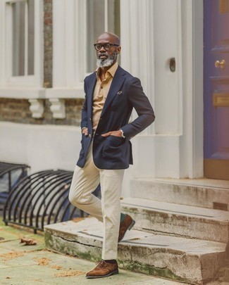 Brown Suede Brogues Outfits: This pairing of a navy blazer and beige dress pants is a solid bet when you need to look truly sharp and classy. Amp up this outfit by wearing a pair of brown suede brogues.