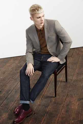 Dark Brown Polo Outfits For Men: Wear a dark brown polo and navy jeans for a fuss-free look that's also well-executed. Burgundy leather derby shoes are an effective way to inject a touch of class into this ensemble.