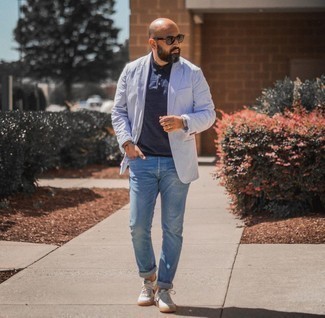 Grey Leather Watch Outfits For Men: For a casual look, wear a light blue vertical striped seersucker blazer and a grey leather watch — these two items work pretty good together. Parade your refined side by finishing off with white and navy leather low top sneakers.
