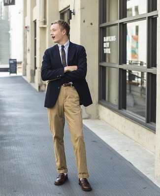 Navy Blazer Outfits For Men: This combo of a navy blazer and khaki chinos is a must-try effortlessly sleek ensemble for any man. A trendy pair of dark brown leather loafers is an easy way to transform this outfit.