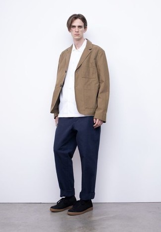 Tan Cotton Blazer Outfits For Men: A tan cotton blazer and navy chinos are an easy way to introduce some elegance into your day-to-day routine. To give this look a more casual spin, introduce black suede low top sneakers to the mix.