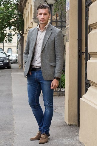Grey Wool Blazer Outfits For Men: Consider wearing a grey wool blazer and navy jeans and you'll achieve a sleek and classy getup. Brown suede derby shoes will give an added dose of class to an otherwise mostly casual ensemble.