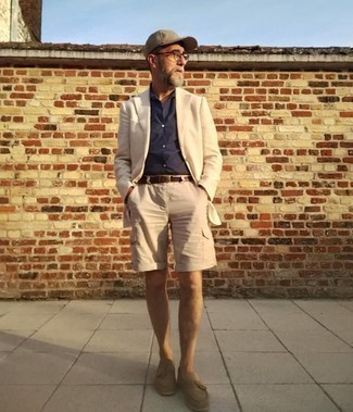 Beige Vertical Striped Blazer Outfits For Men: Teaming a beige vertical striped blazer with beige shorts is a savvy idea for an off-duty but sharp ensemble. And if you need to instantly step up your outfit with footwear, complete your ensemble with a pair of tan suede tassel loafers.