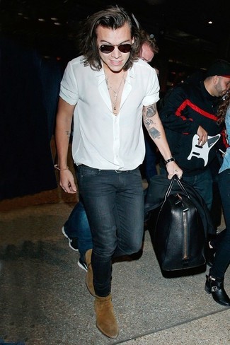 Harry Styles wearing Black Blazer, White Short Sleeve Shirt, Navy Skinny Jeans, Brown Suede Chelsea Boots