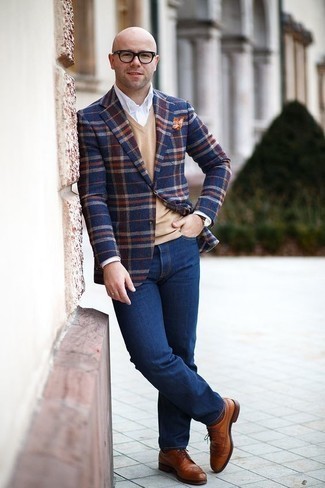 Navy and White Plaid Blazer Outfits For Men: Why not try pairing a navy and white plaid blazer with navy jeans? These two items are very practical and look awesome matched together. And if you wish to instantly bump up your outfit with footwear, introduce tobacco leather brogues to your getup.