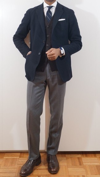 Blue Leather Watch Outfits For Men: Rushed mornings require a straightforward yet casually dapper look, such as a navy blazer and a blue leather watch. Why not complement this outfit with a pair of dark brown leather oxford shoes for an added dose of elegance?