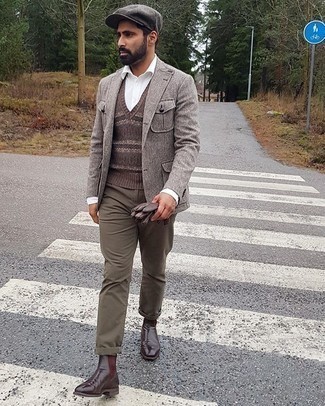 Brown Print Sweater Vest Outfits For Men: When the occasion calls for a casually stylish outfit, consider wearing a brown print sweater vest and olive chinos. Amp up the dressiness of this ensemble a bit by rounding off with dark brown leather chelsea boots.