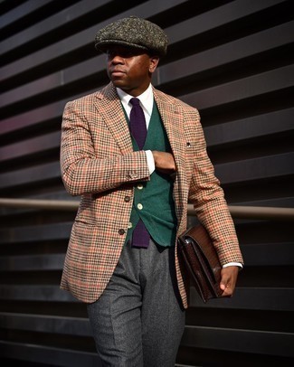 Dark Green Sweater Vest Outfits For Men: Combining a dark green sweater vest and charcoal wool dress pants is a surefire way to infuse personality into your closet.