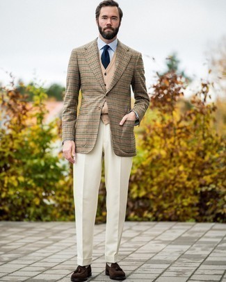 Tan Sweater Vest Outfits For Men: Pair a tan sweater vest with white dress pants for refined style with a modern take. Infuse a more casual finish into this getup by rounding off with dark brown suede tassel loafers.