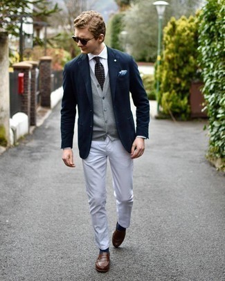 Navy Blazer with Grey Sweater Outfits For Men: Marrying a navy blazer with a grey sweater is an amazing choice for a sharp and sophisticated getup. To add more class to your getup, finish off with a pair of brown leather loafers.