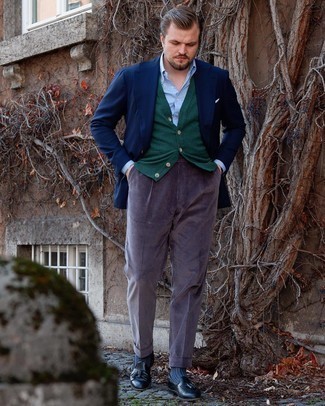 Dark Green Sweater Vest Outfits For Men: Putting together a dark green sweater vest with violet corduroy dress pants is a savvy idea for a stylish and classy ensemble. Feeling brave today? Spice things up by finishing off with black leather tassel loafers.
