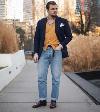 Brown Sweater Vest Outfits For Men: A brown sweater vest and light blue jeans will add serious style to your current styling rotation. Infuse your getup with a sense of sophistication by rounding off with dark brown leather loafers.