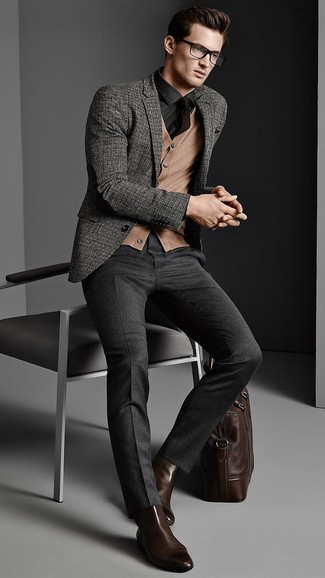 Tan Sweater Vest Outfits For Men: Dial up the masculinity factor in a tan sweater vest and charcoal wool dress pants. To introduce a laid-back feel to your look, add dark brown leather chelsea boots to this look.