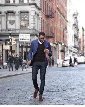 Tobacco Sweater Vest Outfits For Men: This pairing of a tobacco sweater vest and navy jeans will prove your prowess in men's fashion. For something more on the smart end to complement your look, add brown suede tassel loafers to the mix.