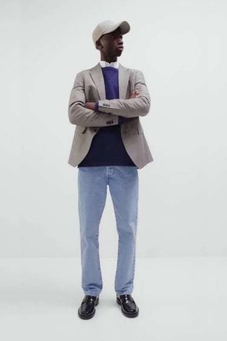 Light Blue Jeans Outfits For Men: This classic and casual combination of a grey blazer and light blue jeans is capable of taking on different moods depending on the way it's styled. For something more on the classy side to complete this outfit, add black leather loafers to your getup.