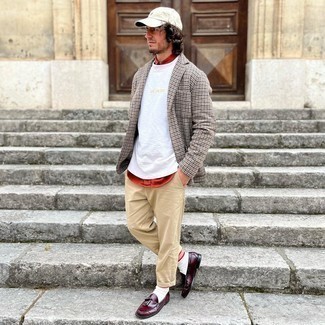 Burgundy Leather Tassel Loafers Outfits: As you can see here, looking casually neat doesn't require that much effort. Make a brown houndstooth blazer and khaki chinos your outfit choice and you'll look awesome. If you want to feel a bit more polished now, add burgundy leather tassel loafers to the mix.