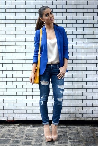 Navy Ripped Skinny Jeans Outfits: This pairing of a blue blazer and navy ripped skinny jeans combines comfort and practicality and helps keep it low profile yet contemporary. If you need to instantly up the style ante of this ensemble with shoes, why not complete your ensemble with a pair of beige leather heeled sandals?