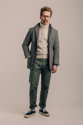 Grey Herringbone Wool Blazer Smart Casual Outfits For Men: For an effortlessly sleek ensemble, wear a grey herringbone wool blazer with dark green chinos — these pieces fit pretty good together. Complete your look with a pair of navy canvas low top sneakers to effortlessly dial up the street cred of this outfit.