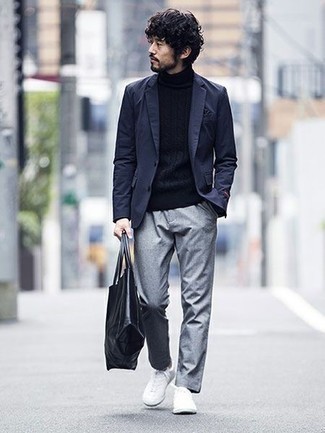 Navy Knit Wool Turtleneck Outfits For Men: For a cool and casual look, team a navy knit wool turtleneck with grey chinos — these items play really nice together. Complement your getup with a pair of white leather low top sneakers et voila, the ensemble is complete.