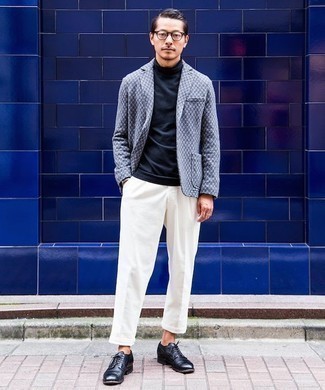 Navy Turtleneck Outfits For Men: This pairing of a navy turtleneck and white chinos is a great ensemble for off duty. If you want to immediately polish up this outfit with one single piece, introduce black leather derby shoes to this look.