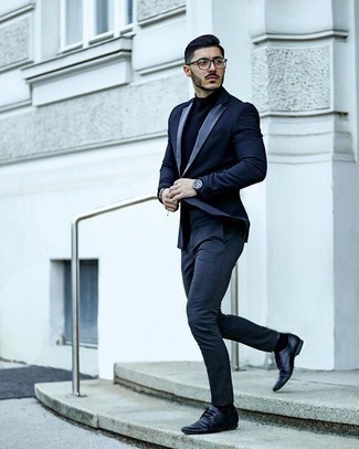 Navy Turtleneck Outfits For Men: Dress in a navy turtleneck and charcoal chinos to pull together a cool and casual outfit. Complete this outfit with a pair of black leather derby shoes to effortlessly kick up the style factor of your ensemble.