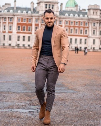 Navy Turtleneck Outfits For Men: You're looking at the indisputable proof that a navy turtleneck and charcoal check chinos look awesome if you wear them together in a casual getup. To introduce some extra flair to your outfit, introduce a pair of brown suede chelsea boots to the mix.