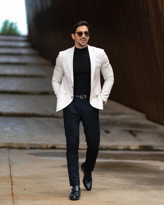 White Blazer Outfits For Men: Teaming a white blazer with navy chinos is a great pick for a casually smart ensemble. Put an elegant spin on an otherwise straightforward getup with black leather double monks.