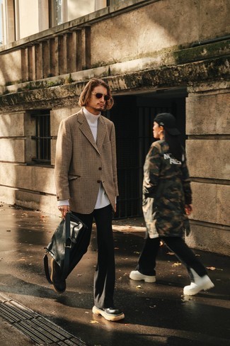 Black Leather Messenger Bag Outfits: A tan houndstooth blazer and a black leather messenger bag are a nice outfit formula to have in your casual sartorial collection. Add a pair of black leather chelsea boots to your look to immediately rev up the fashion factor of your ensemble.