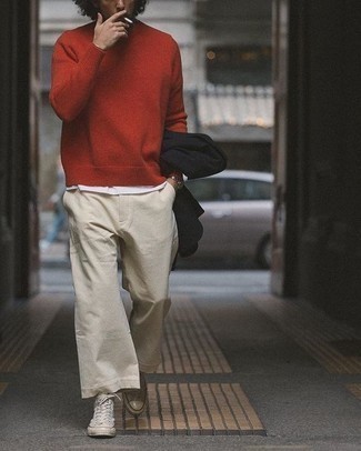 Red Wool Turtleneck Outfits For Men: Super dapper, this casual pairing of a red wool turtleneck and beige chinos provides with wonderful styling opportunities. Make your outfit current by finishing off with a pair of white canvas high top sneakers.