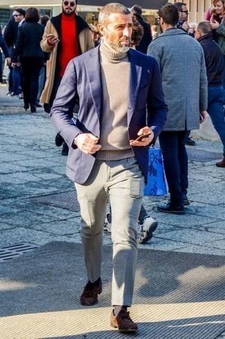 Tan Wool Turtleneck Outfits For Men: This classy combination of a tan wool turtleneck and grey dress pants will cement your outfit coordination chops. When it comes to shoes, this look pairs nicely with brown suede tassel loafers.
