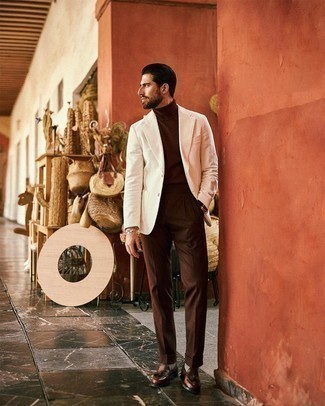 Brown Turtleneck Outfits For Men: A brown turtleneck looks especially classy when paired with brown dress pants. Add brown leather tassel loafers to your ensemble and you're all set looking dashing.