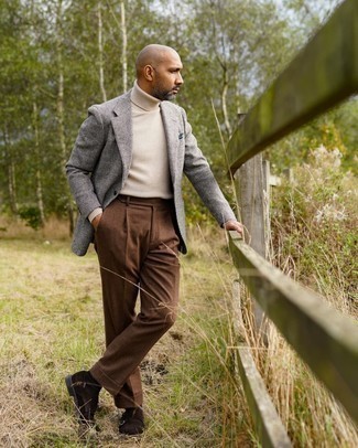 Beige Wool Turtleneck Outfits For Men: A beige wool turtleneck and brown dress pants are absolute mainstays if you're planning a stylish wardrobe that matches up to the highest sartorial standards. Complement this ensemble with a pair of dark brown suede double monks et voila, this outfit is complete.