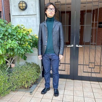 Dark Green Turtleneck Outfits For Men: This casual combination of a dark green turtleneck and navy jeans is a goofproof option when you need to look cool in a flash. Feeling transgressive today? Spruce up this look by rounding off with a pair of navy leather brogues.