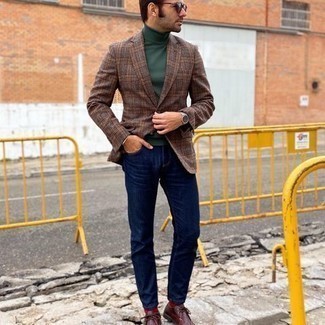 Brown Plaid Blazer Outfits For Men: Such pieces as a brown plaid blazer and navy jeans are the perfect way to infuse effortless cool into your day-to-day casual collection. A pair of burgundy leather desert boots is a smart choice to finish off this outfit.