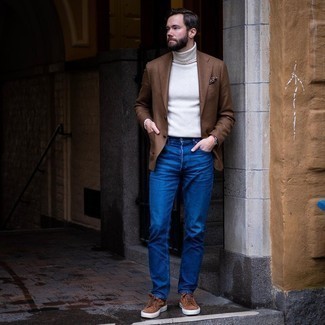 White Wool Turtleneck Outfits For Men: Dress in a white wool turtleneck and blue jeans to assemble an interesting and current relaxed ensemble. If you're wondering how to round off, add brown suede low top sneakers to the mix.