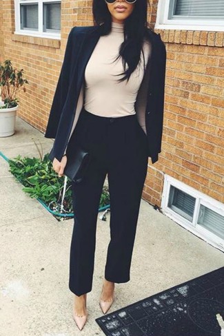 500+ Fall Outfits For Women: Fashionable and functional, this combo of a black blazer and black tapered pants provides with amazing styling opportunities. If you're wondering how to round off, complete your look with beige leather pumps. This one is is a viable choice when it comes to putting together a standout outfit for unpredictable fall weather.