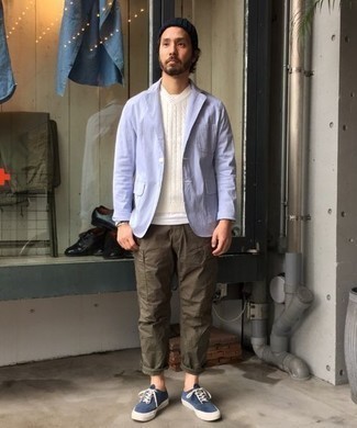 Light Blue Blazer Outfits For Men: A light blue blazer and olive cargo pants combined together are a match made in heaven for men who love casual outfits. Feeling brave? Dress down this look by rocking navy and white canvas low top sneakers.