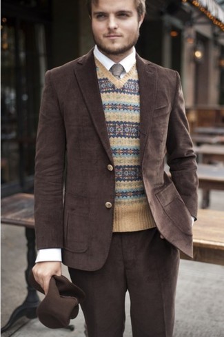 Yellow Fair Isle V-neck Sweater Outfits For Men: Combining a yellow fair isle v-neck sweater and dark brown dress pants is a fail-safe way to infuse your styling arsenal with some masculine sophistication.