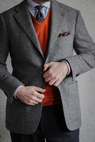 This is definitive proof that a grey wool blazer and black dress pants look awesome when worn together in a sophisticated look for today's guy.
