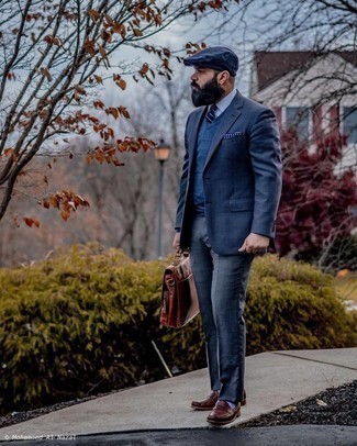 Navy V-neck Sweater Outfits For Men: This combo of a navy v-neck sweater and charcoal dress pants is a safe option when you need to look really stylish. Dark brown leather loafers will pull the whole thing together.